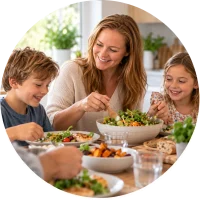 Mother and children enjoying a healthy family meal together
